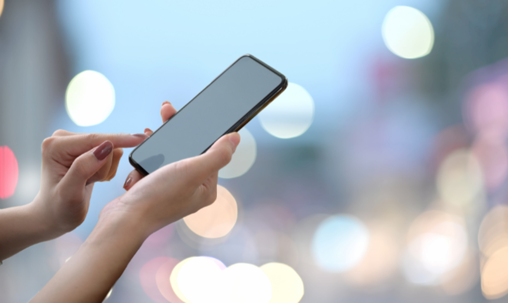 telebanking 2 cell phone in girl's hand