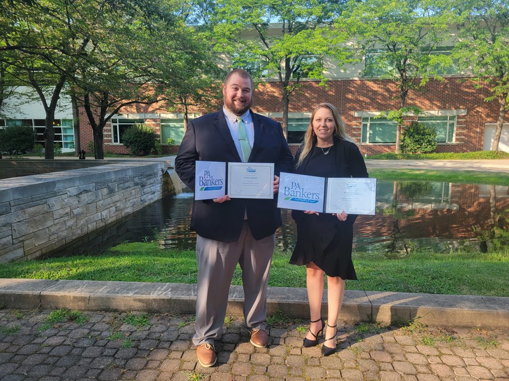 Zachary Sarginger and Toni Levandoski posing after completing the PA Bankers Advanced School of Banking