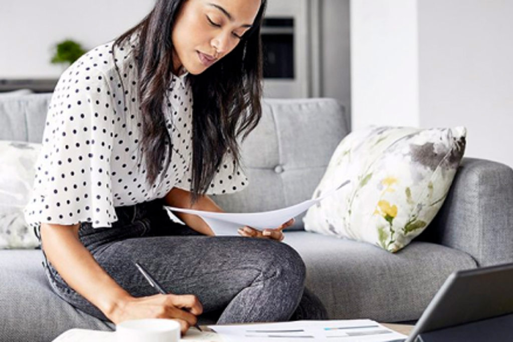 savings or cd secured loans girl working on couch