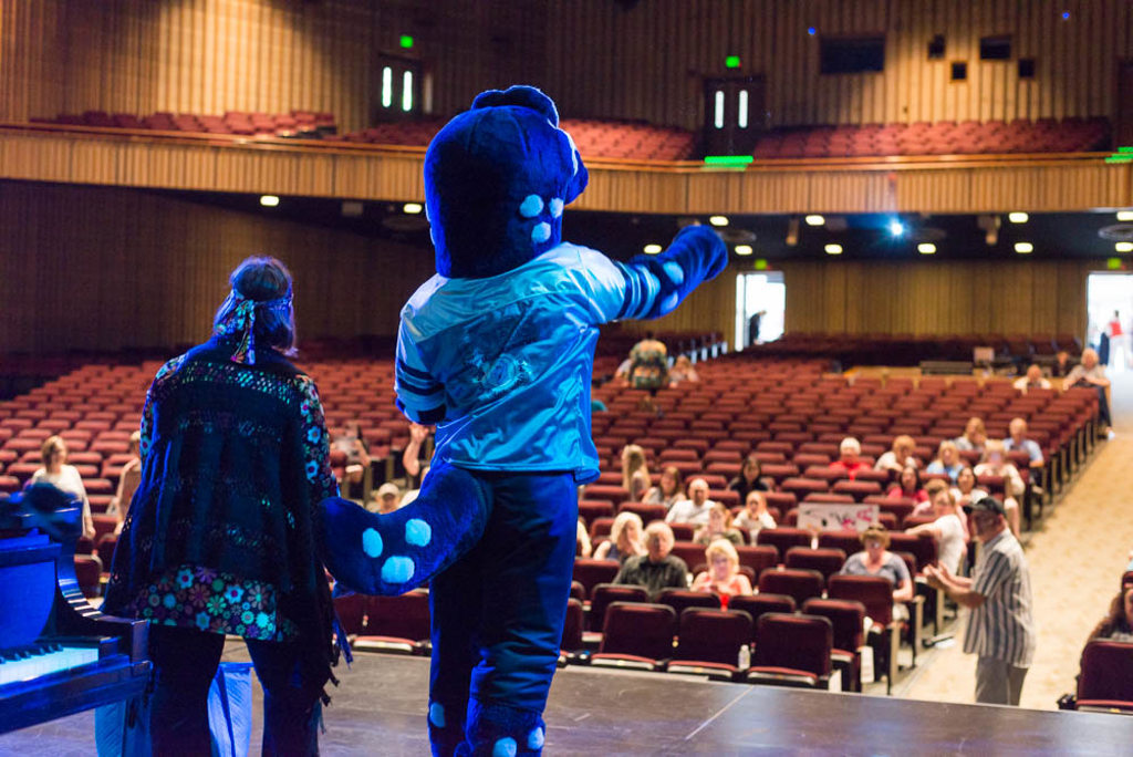 Boris the Bankasaurus Interacting with Teen Star Audience