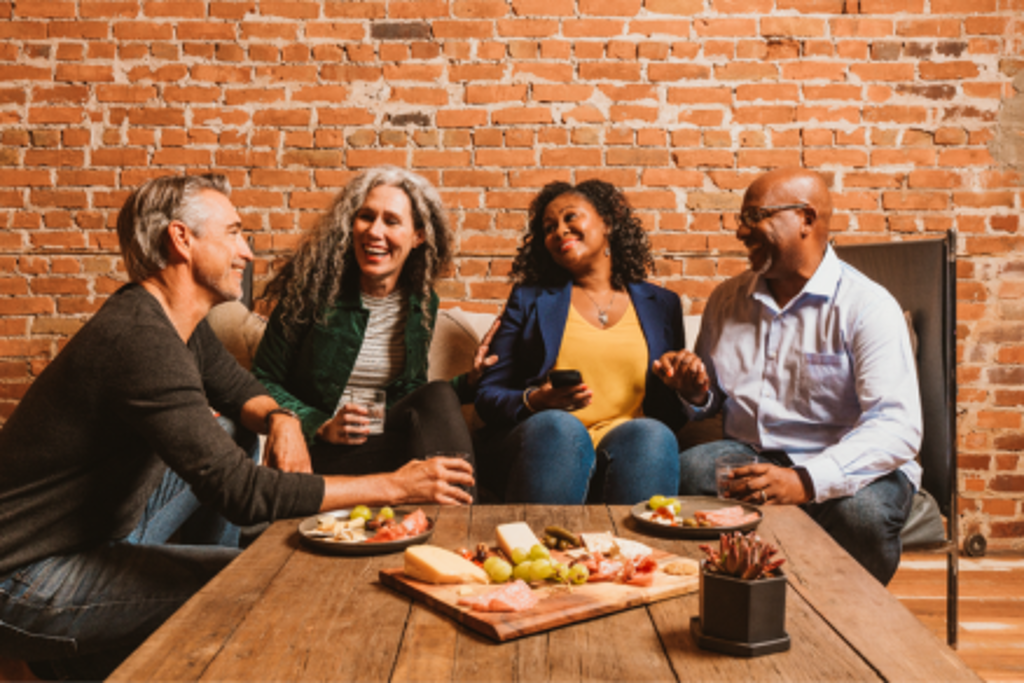 group of friends brick wall